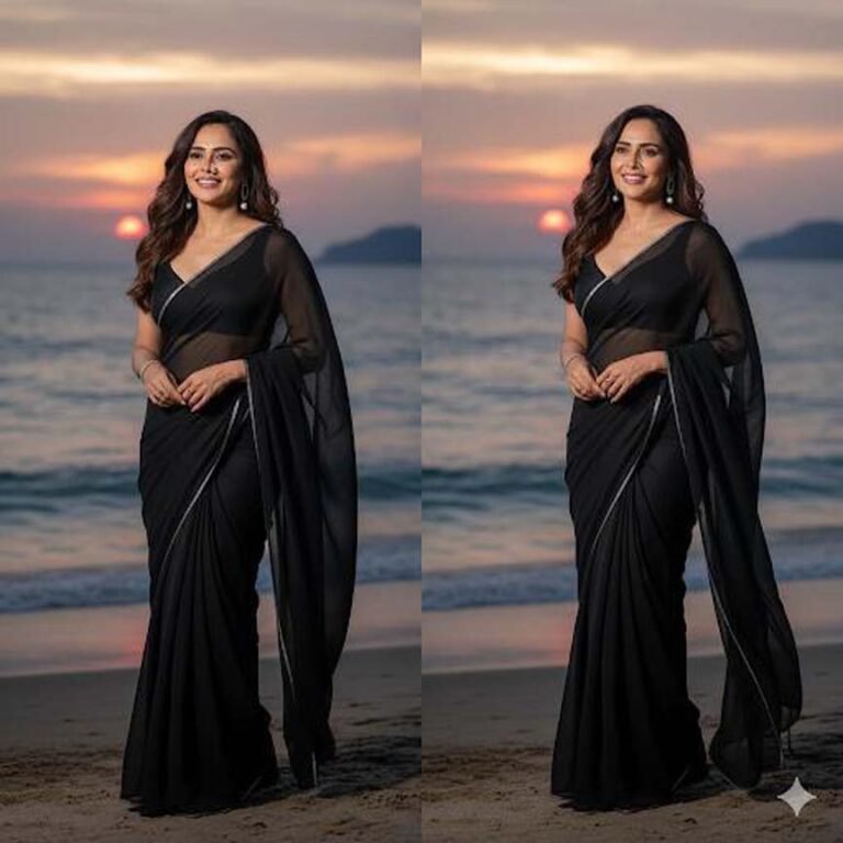 ब्लैक साड़ी में निकिता रावल का बीच लुक छाया